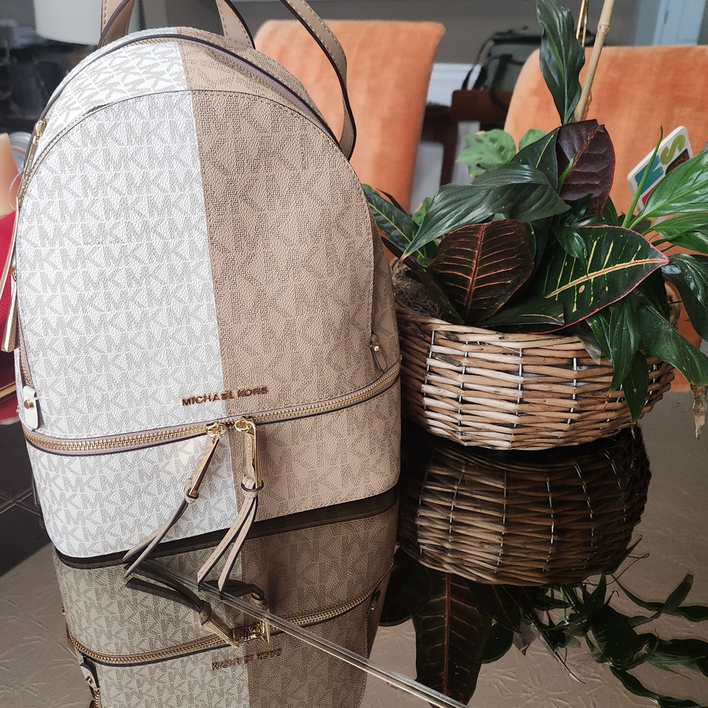 Michael Kors Cream and Brown Backpack with Monogram Pattern and Gold Hardware